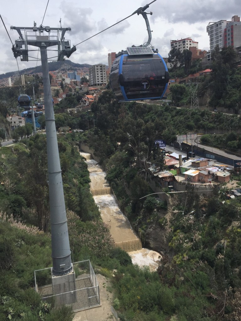 Celeste cable car following the river