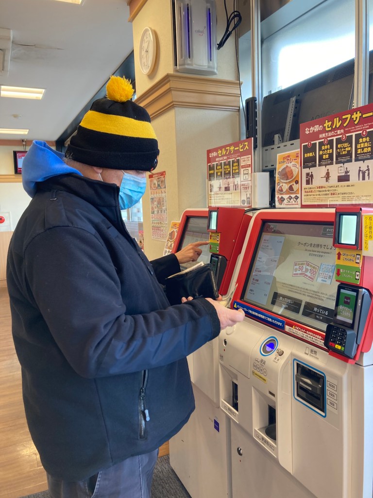 Ordering dinner at Tops Cafe