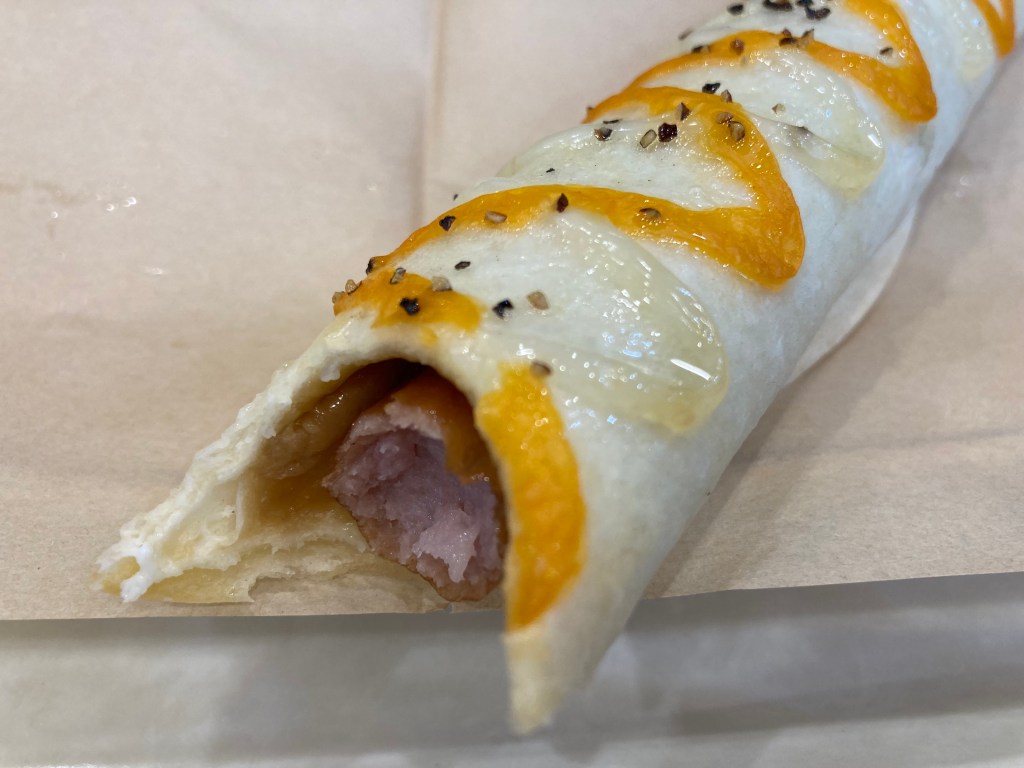 German sausage in Teriyaki sauce wrapped in a tortilla