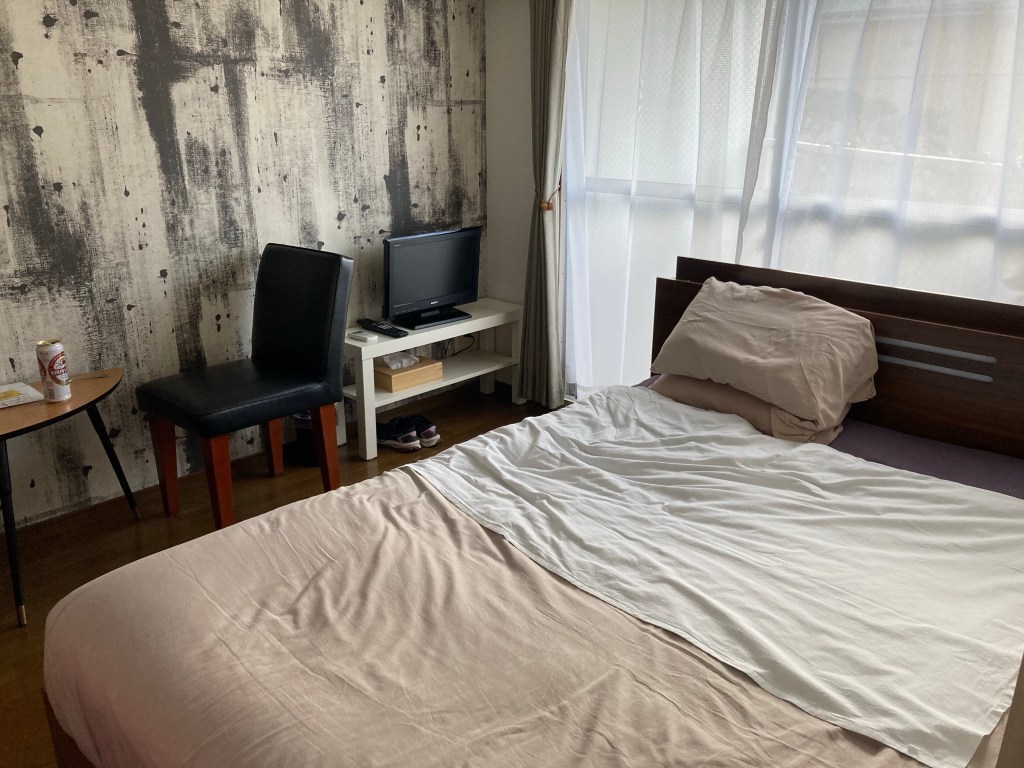 Bedroom/living/dining area at Sonic Apartment Hotel